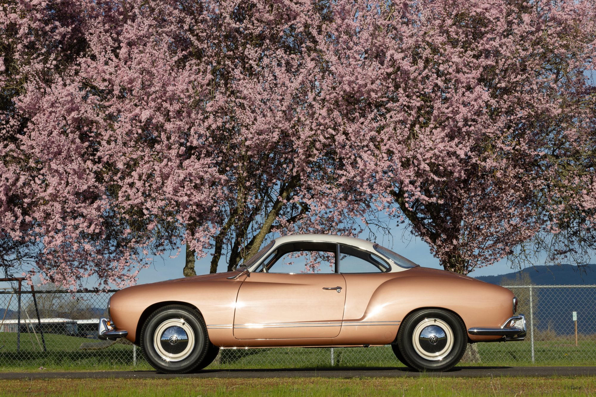The profile of an early Ghia is masterful, and the Cognac paint only adds to the beauty.