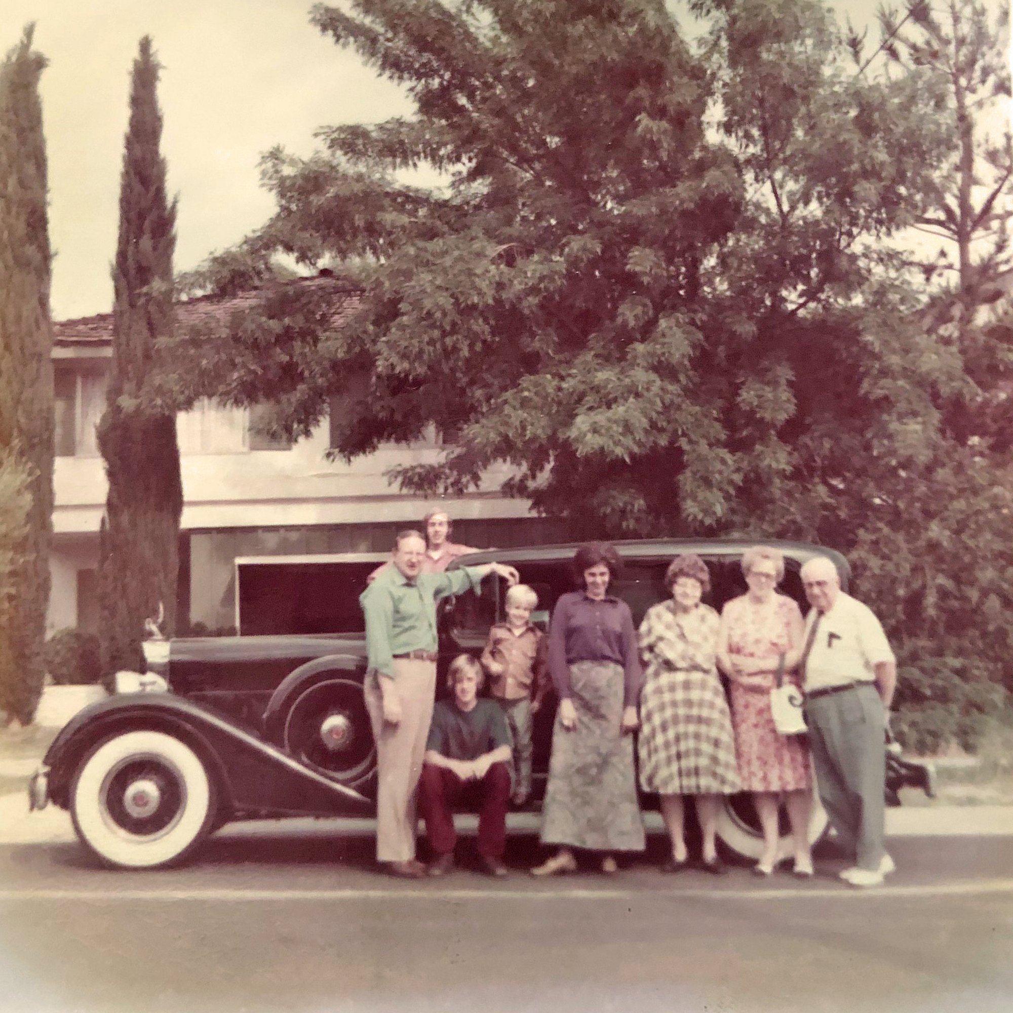 The family's vintage Packard - Randy is standing on the running board.