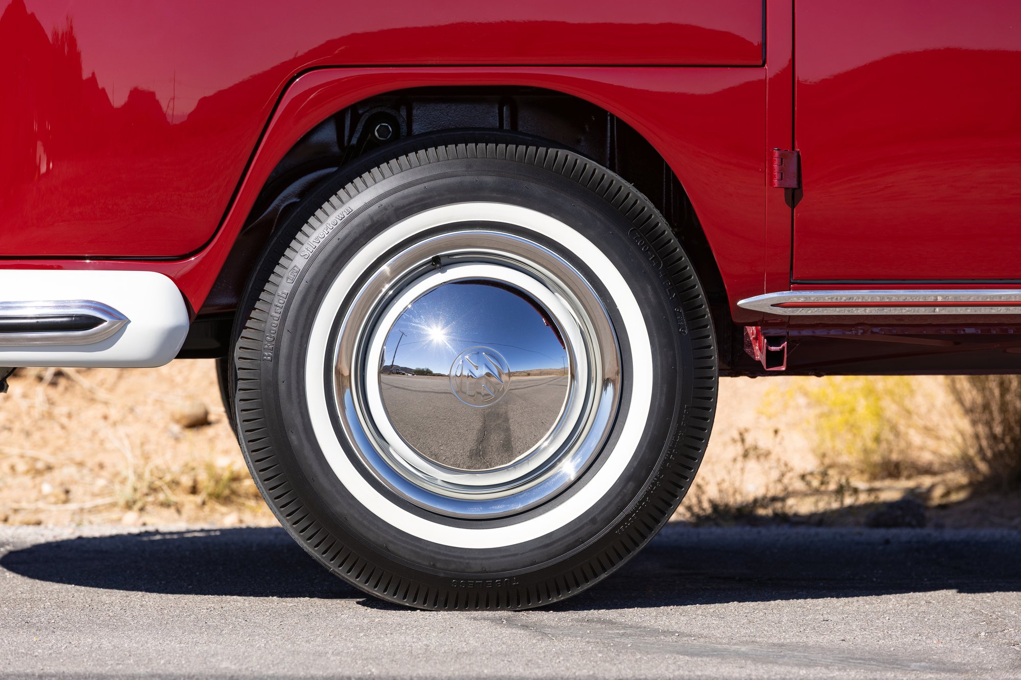 BF Goodrich Silvertown whitewall tires surround the 14-inch stock wheels with beauty rings.